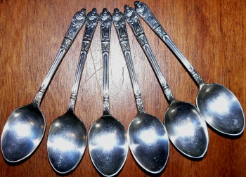 A Plate, A Spoon And A Small Metal Boot
