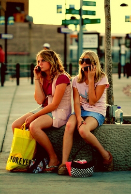 Free Train Station Girls Talking on Cell Phones Creative Commons